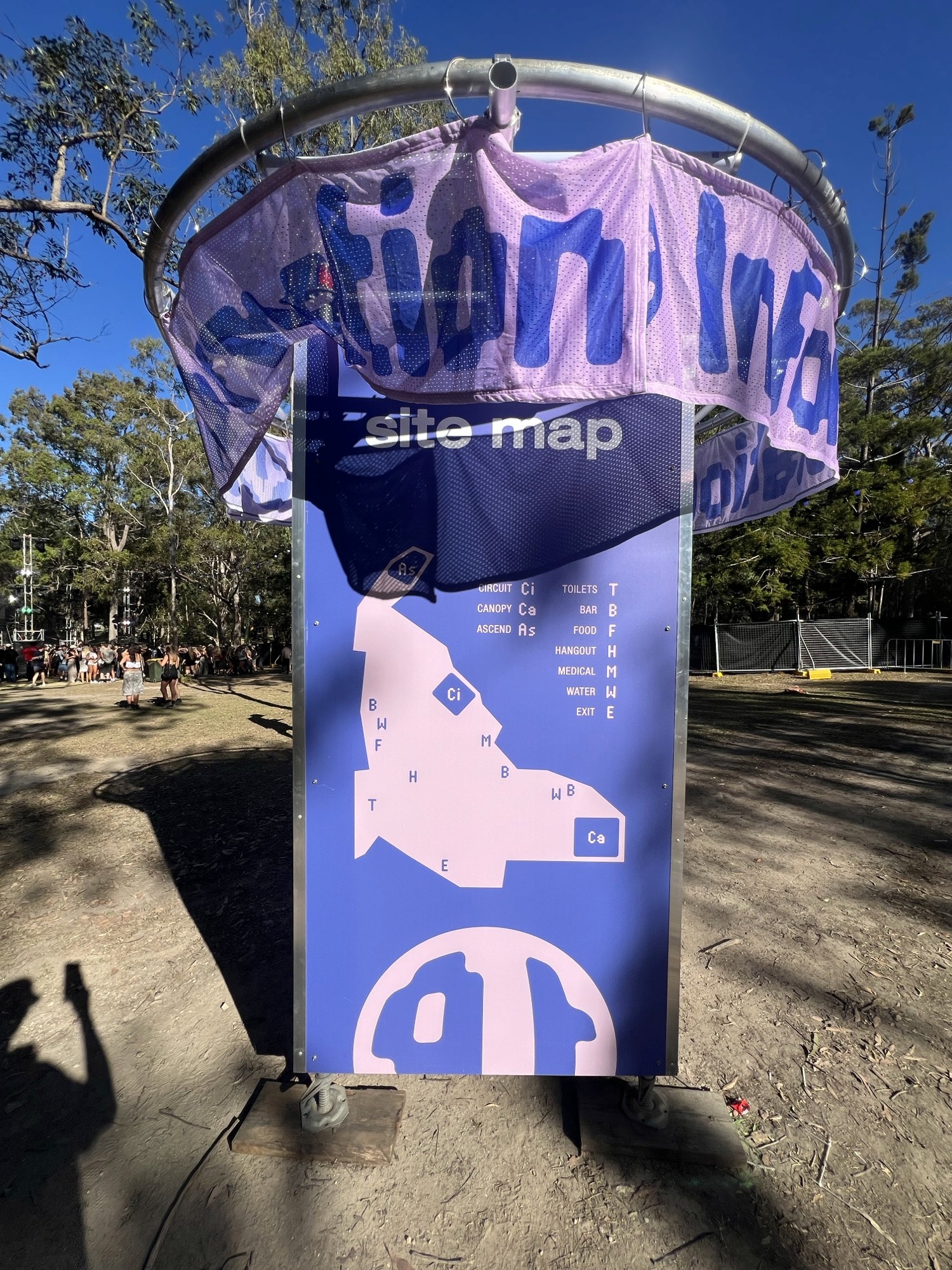 The map boards: the halo band hides the top of the signage, and there's no "You are here".