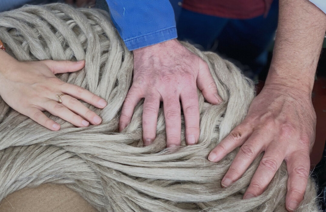 brown and white concrete house near green trees during daytime