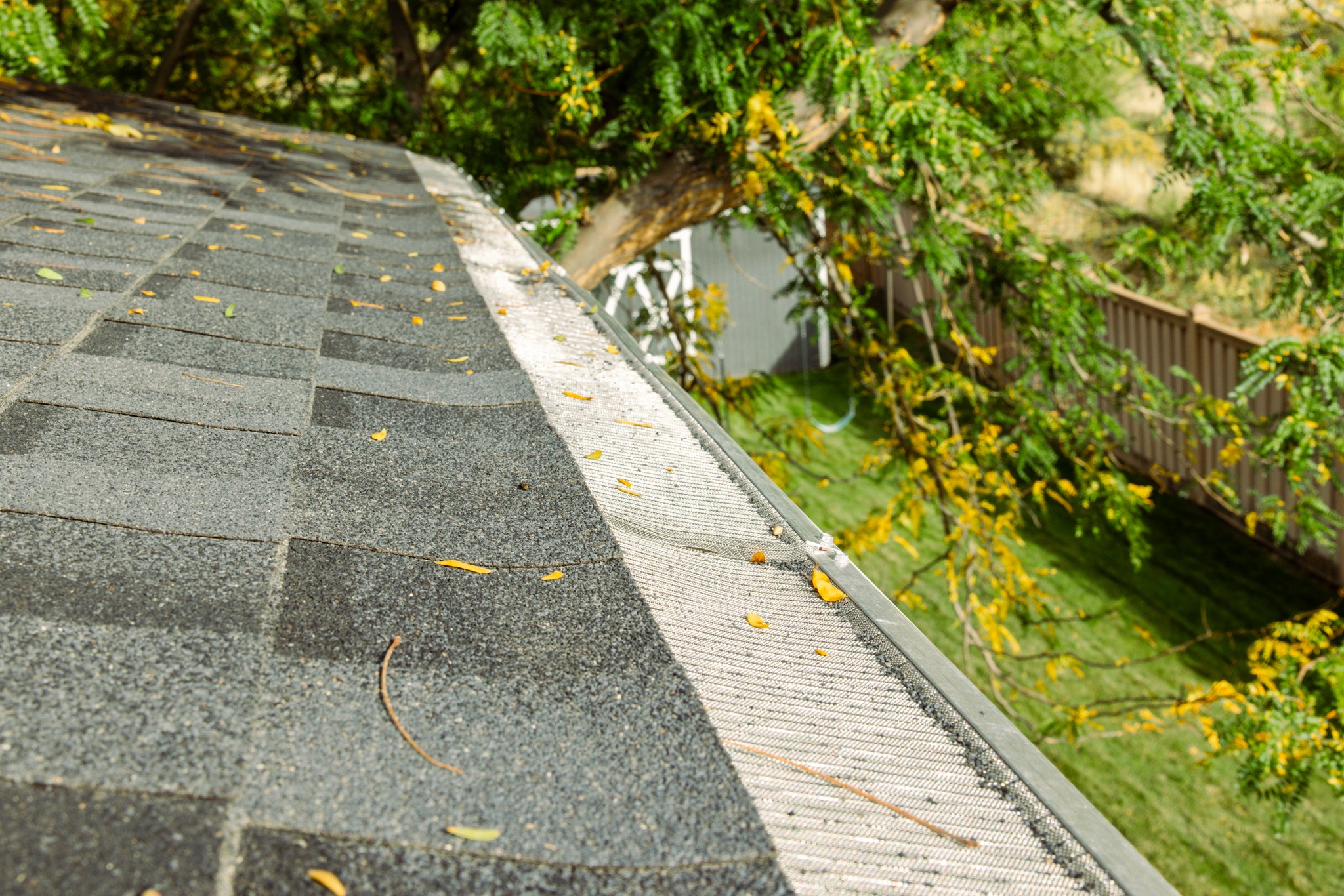 Rain gutter cover installation for leaf protection