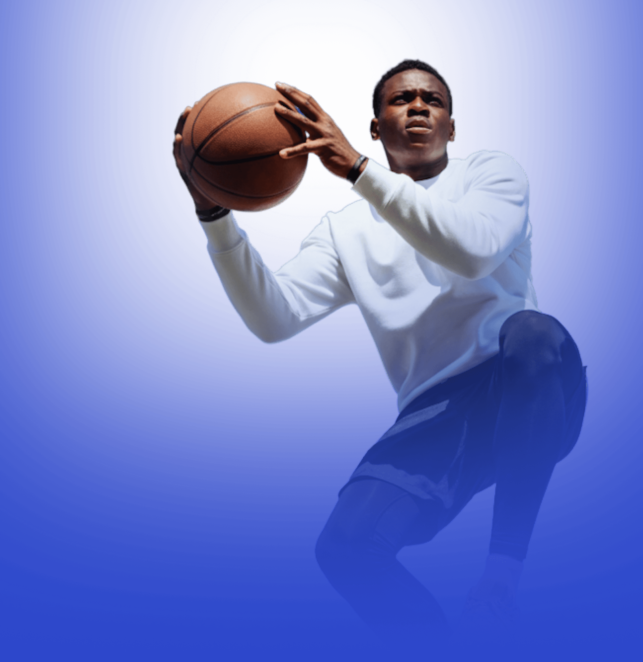 Athlete with a basketball, focused and ready to play.