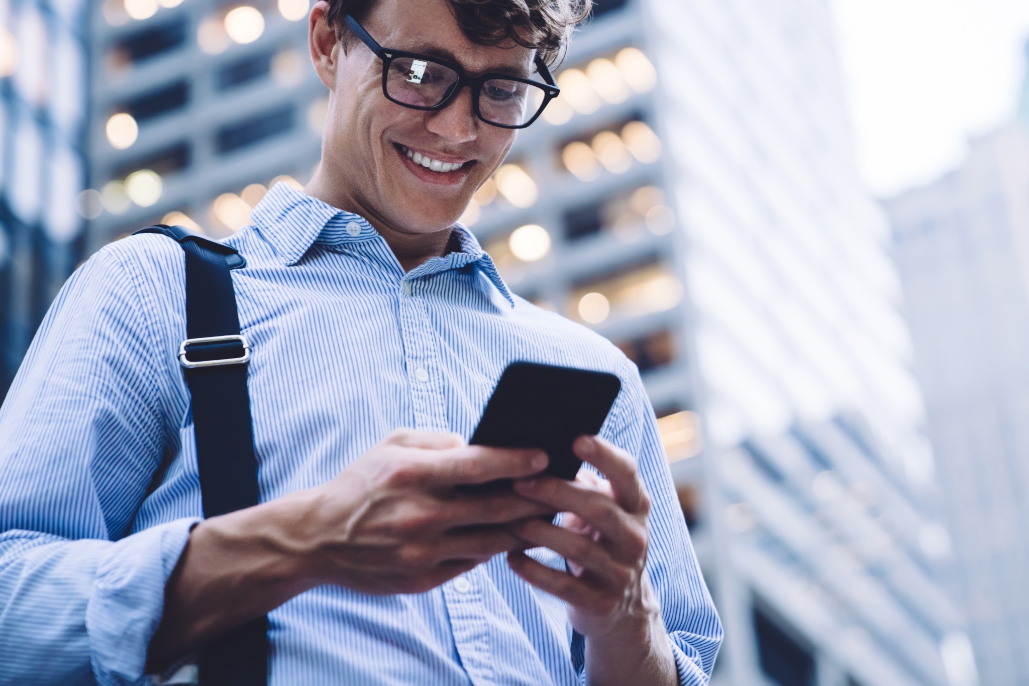 Smiling woman recieving delivery tracking notification