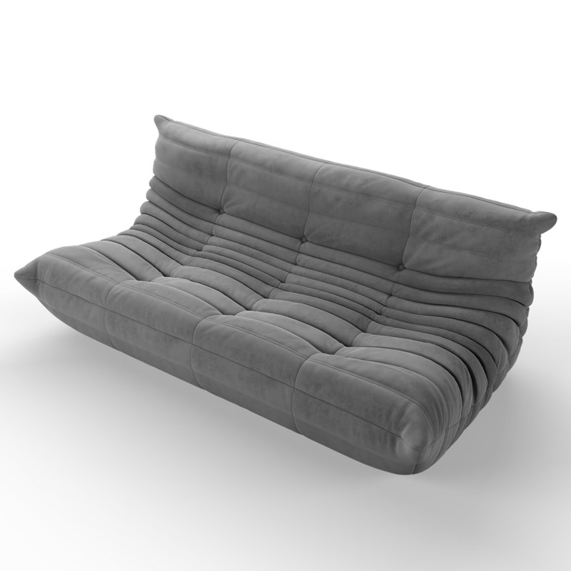 Comfortable Togo sofa chair featuring a sleek, armless design and deep seating, ideal for creating a cozy relaxation space.