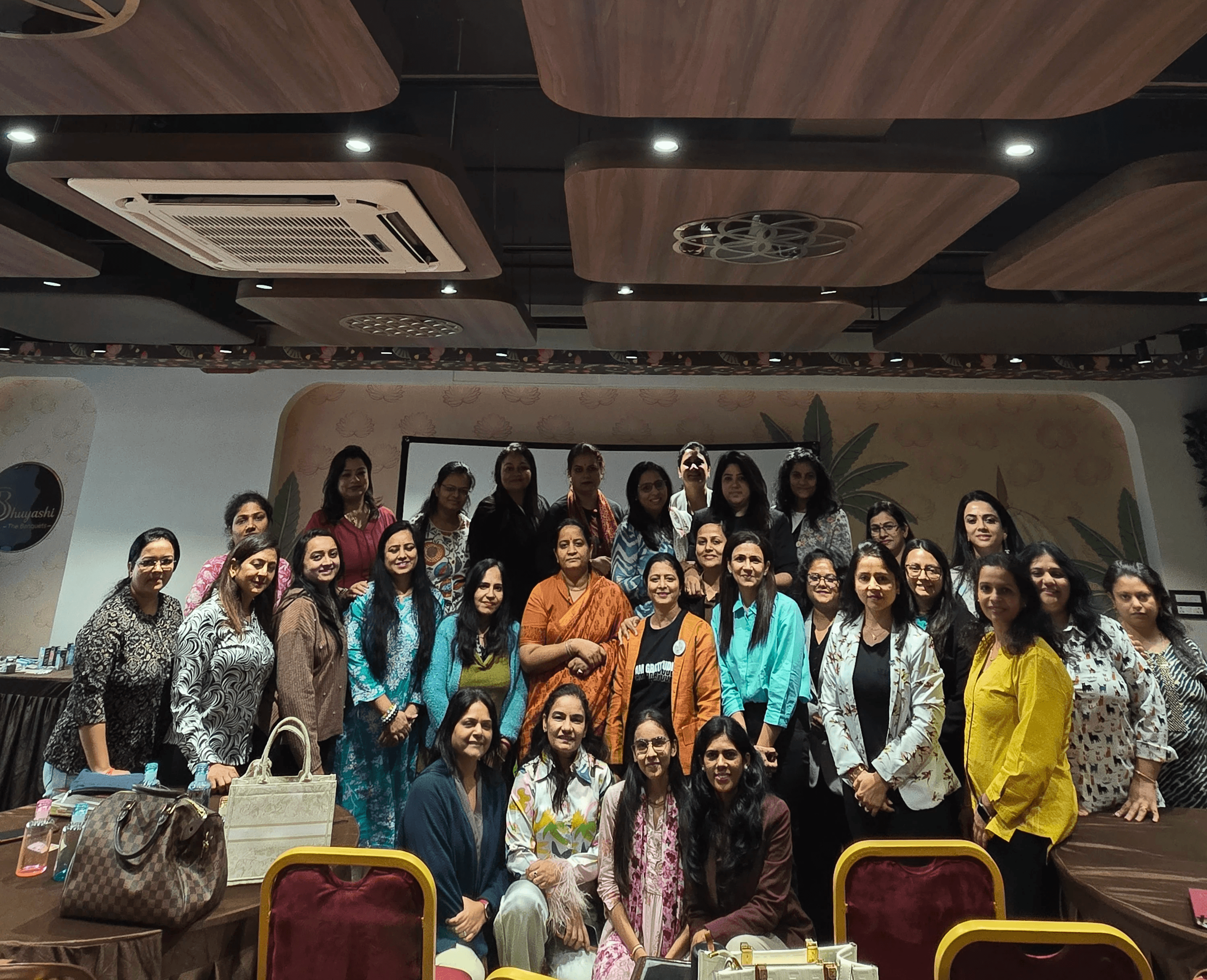 Photo Of People Sitting On Chairs