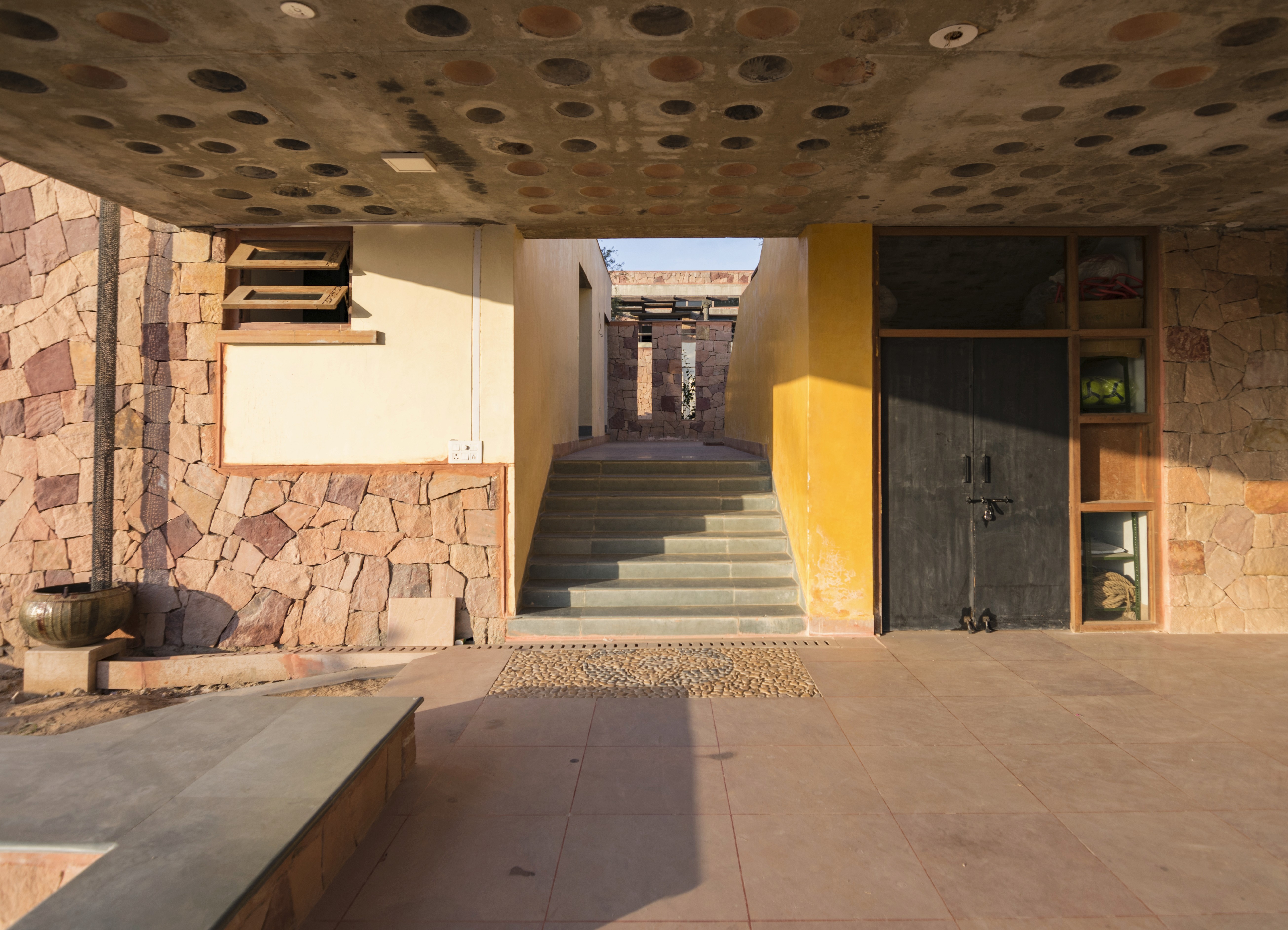 A teacher is helping a student with an assignment