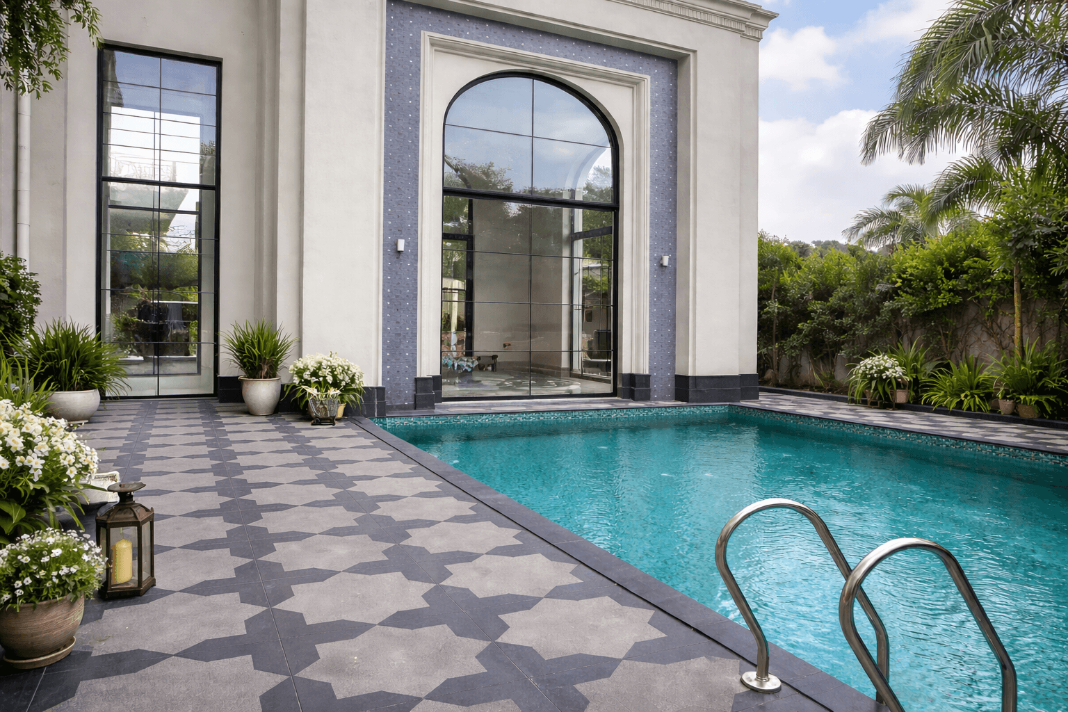 Star stone flooring used in premium residential poolside area with geometric patterned paving design