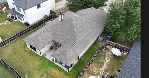 Completed roof: GAF Natural Shadow Weathered Wood roofing project in New Braunfels, 2026, view 16; roof overview used to introduce the installation topic.