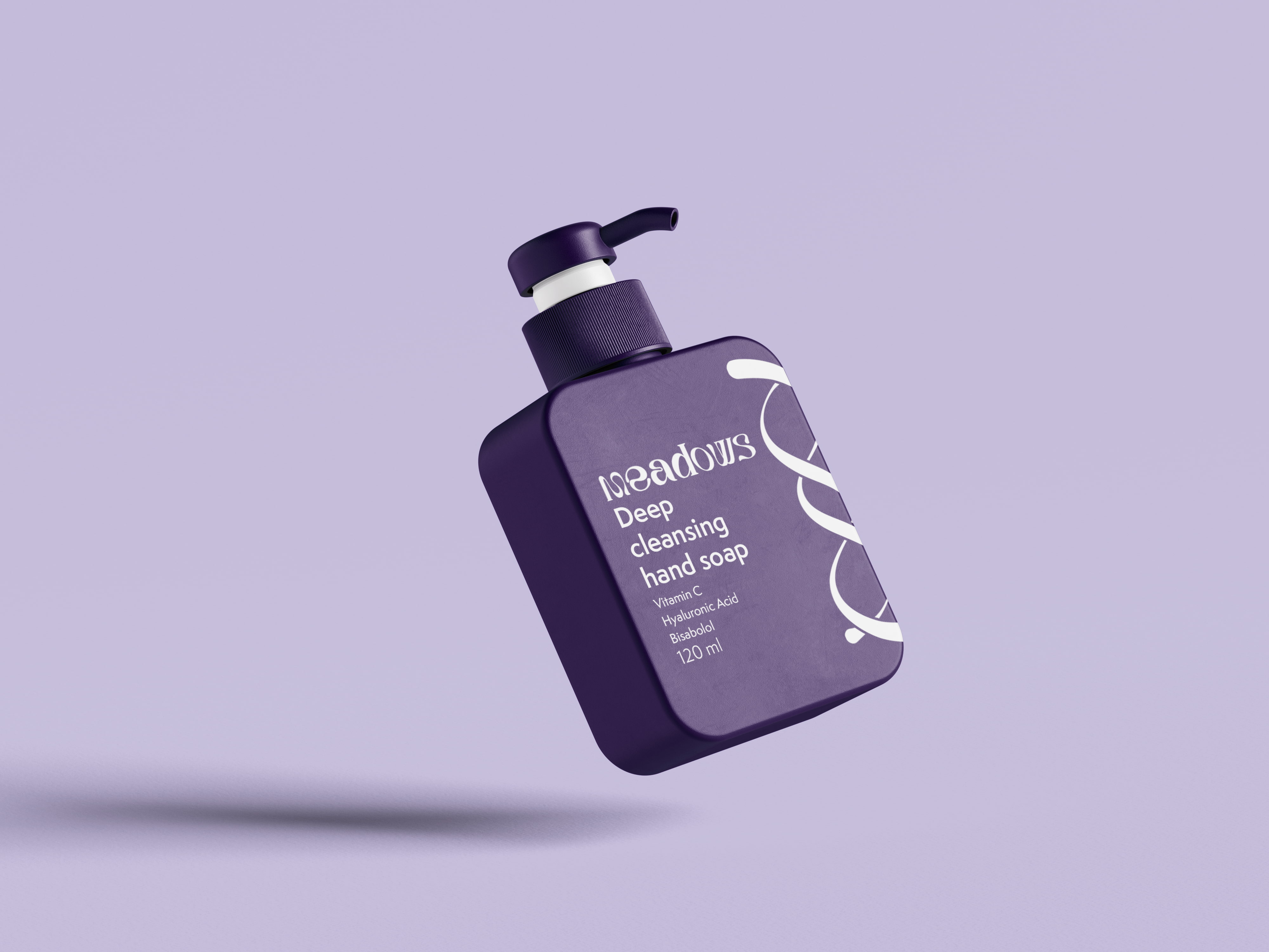 A dark purple meadows branded dispenser bottle, featuring the text “Deep cleansing hand soap”to the left and a large meadow double helix down the right side.