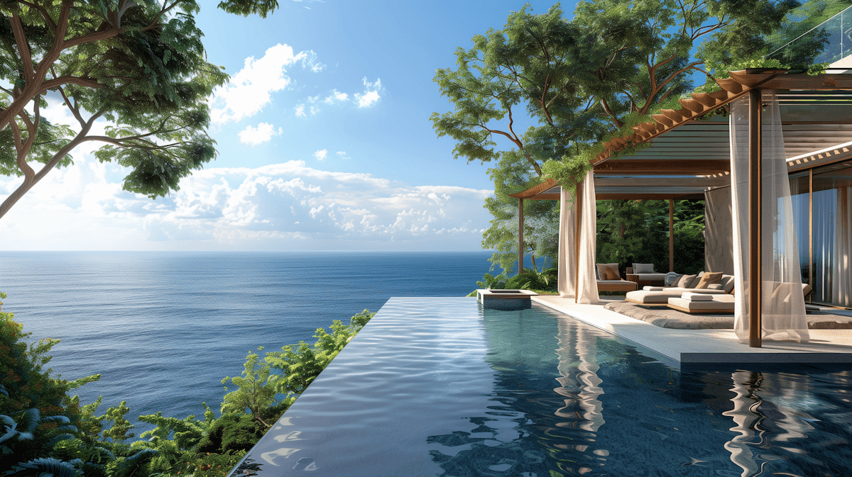 Infinity pool beside a modern home with ocean views and surrounding greenery.
