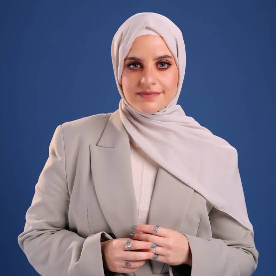 Portrait of Nadine K.