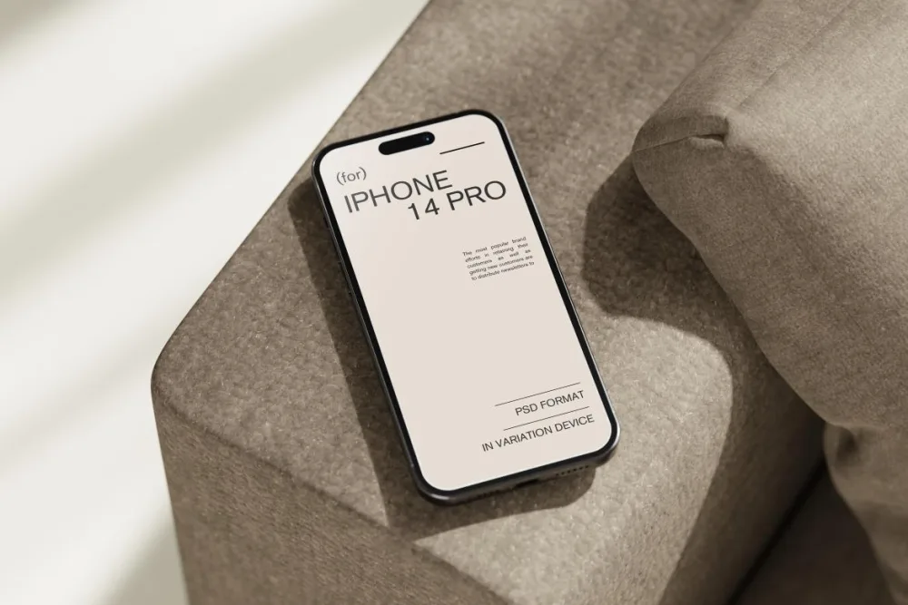 iPhone 14 Pro mockup placed on a textured beige fabric surface, with soft sunlight casting gentle shadows. The screen displays a minimalistic design, emphasizing clean lines and premium detail.