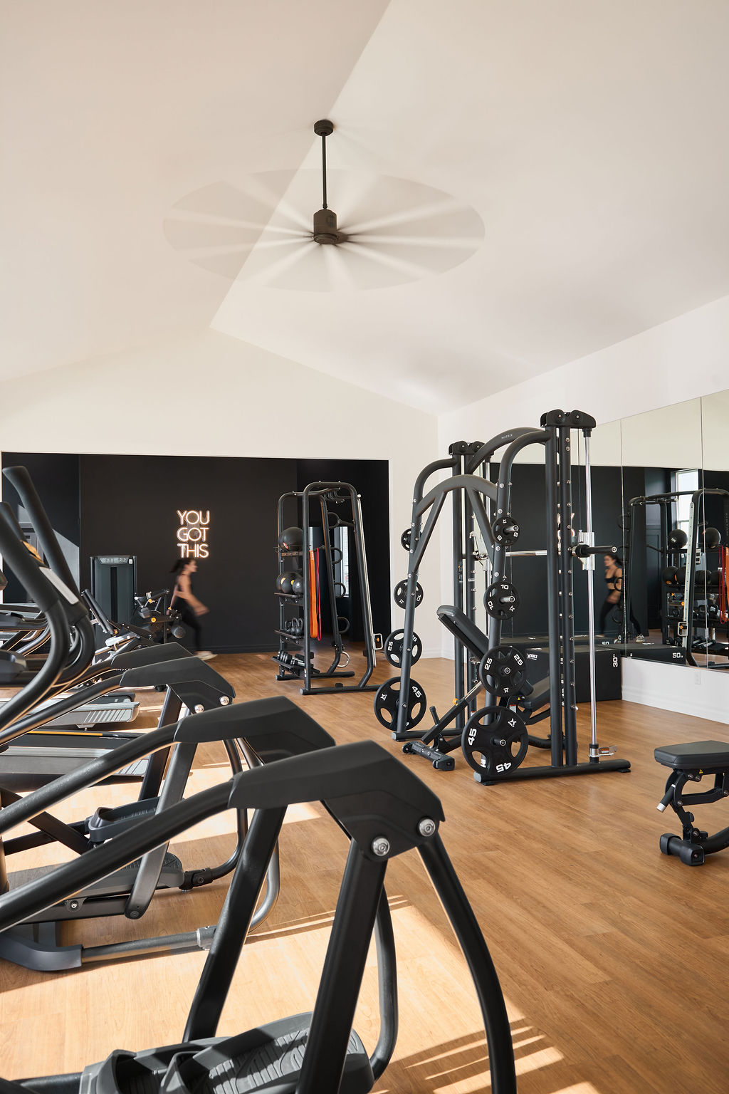 Primary bathroom view of sinks, toilet and shower area