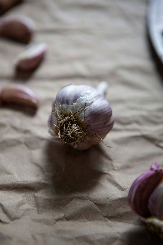 Woman with red hair covering mouth with hair