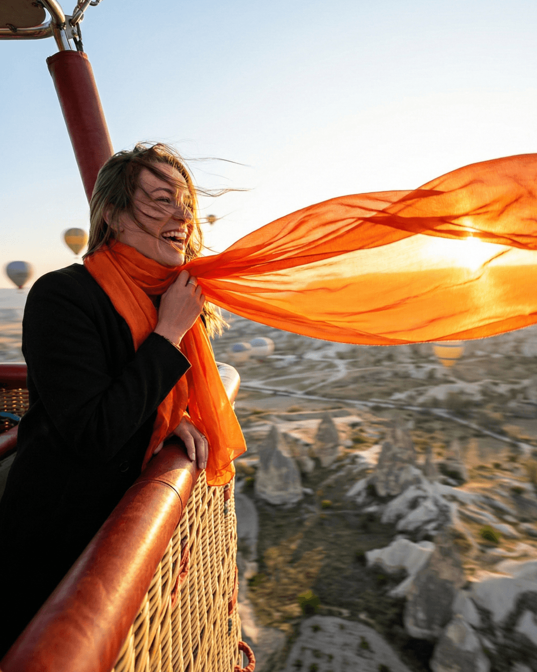 Portrait of Amir Al-Qatifi, founder and lead guide of AlUla desert tours, standing under desert sunlight.