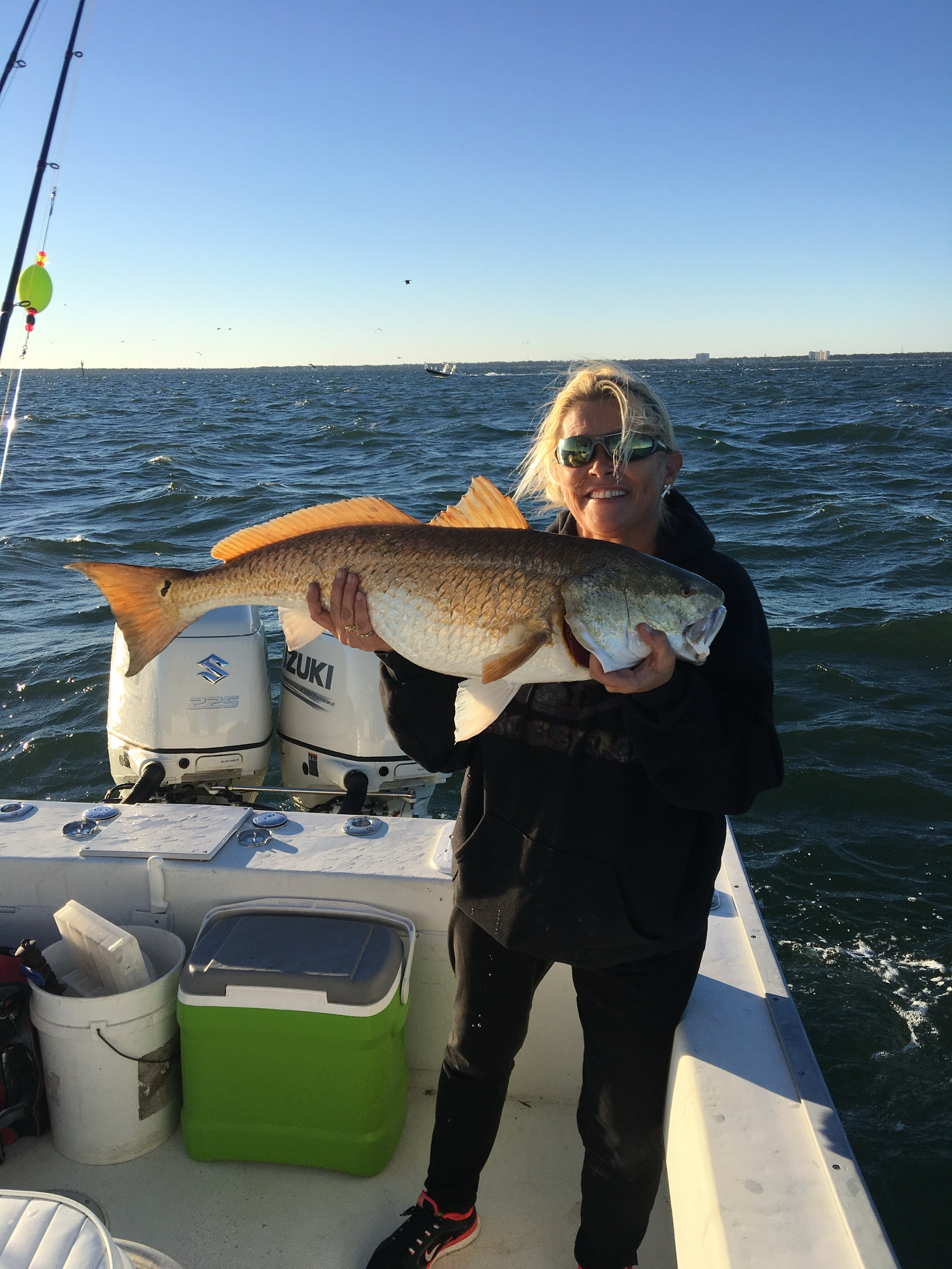 Woman holding a Redfish