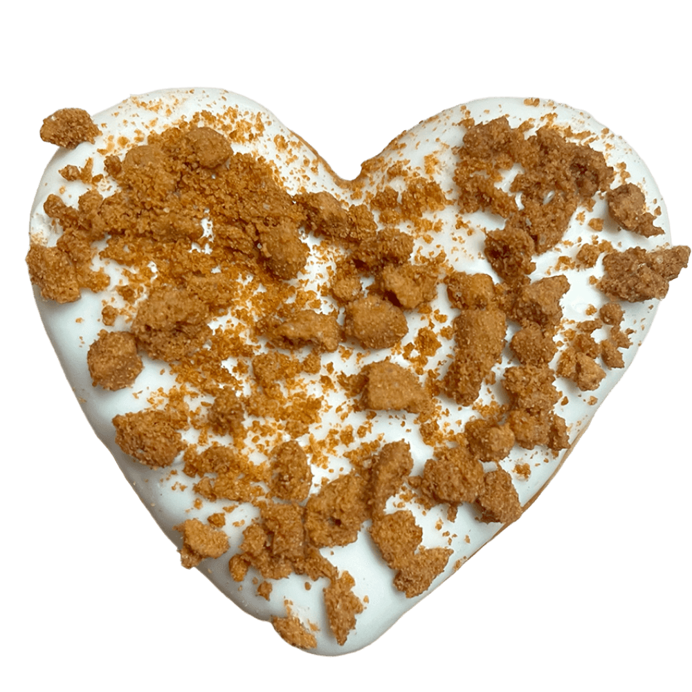 A Dunkin' American Cheesecake Donut, with white chocolate icing, speculoos crumble, and cheesecake filling.