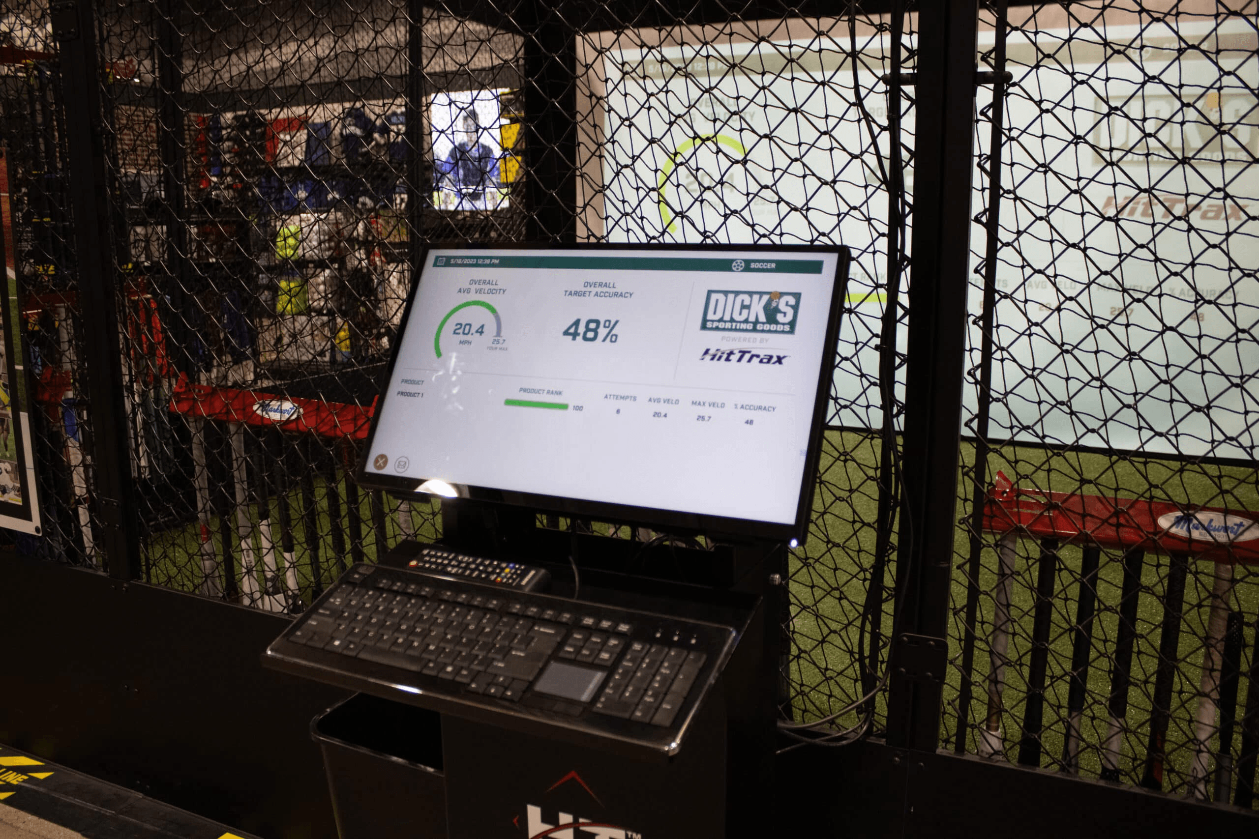 Close-up of a HitTrax simulation screen displaying a virtual baseball field and hit data.
