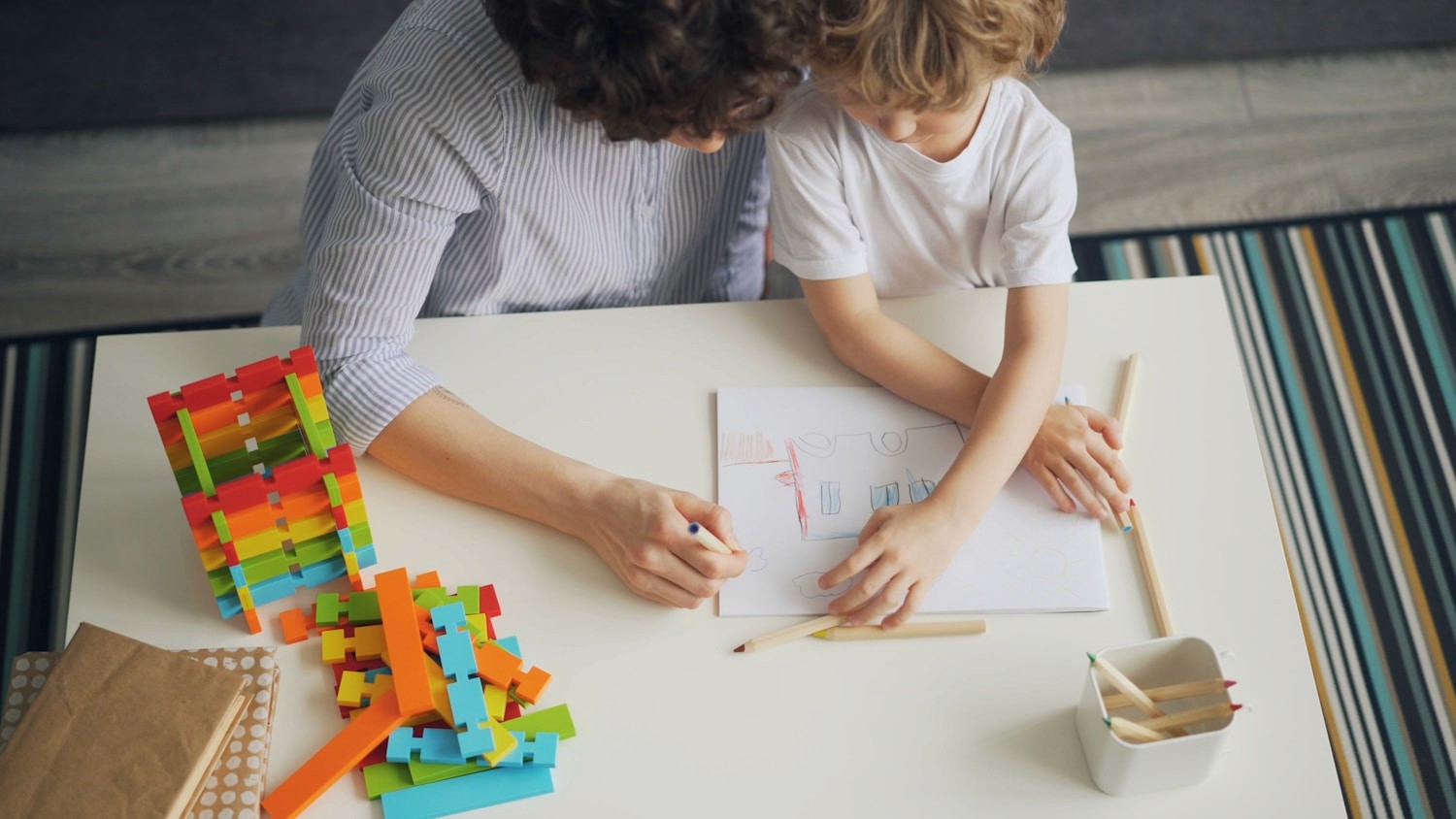 Child and therapist working together at a table