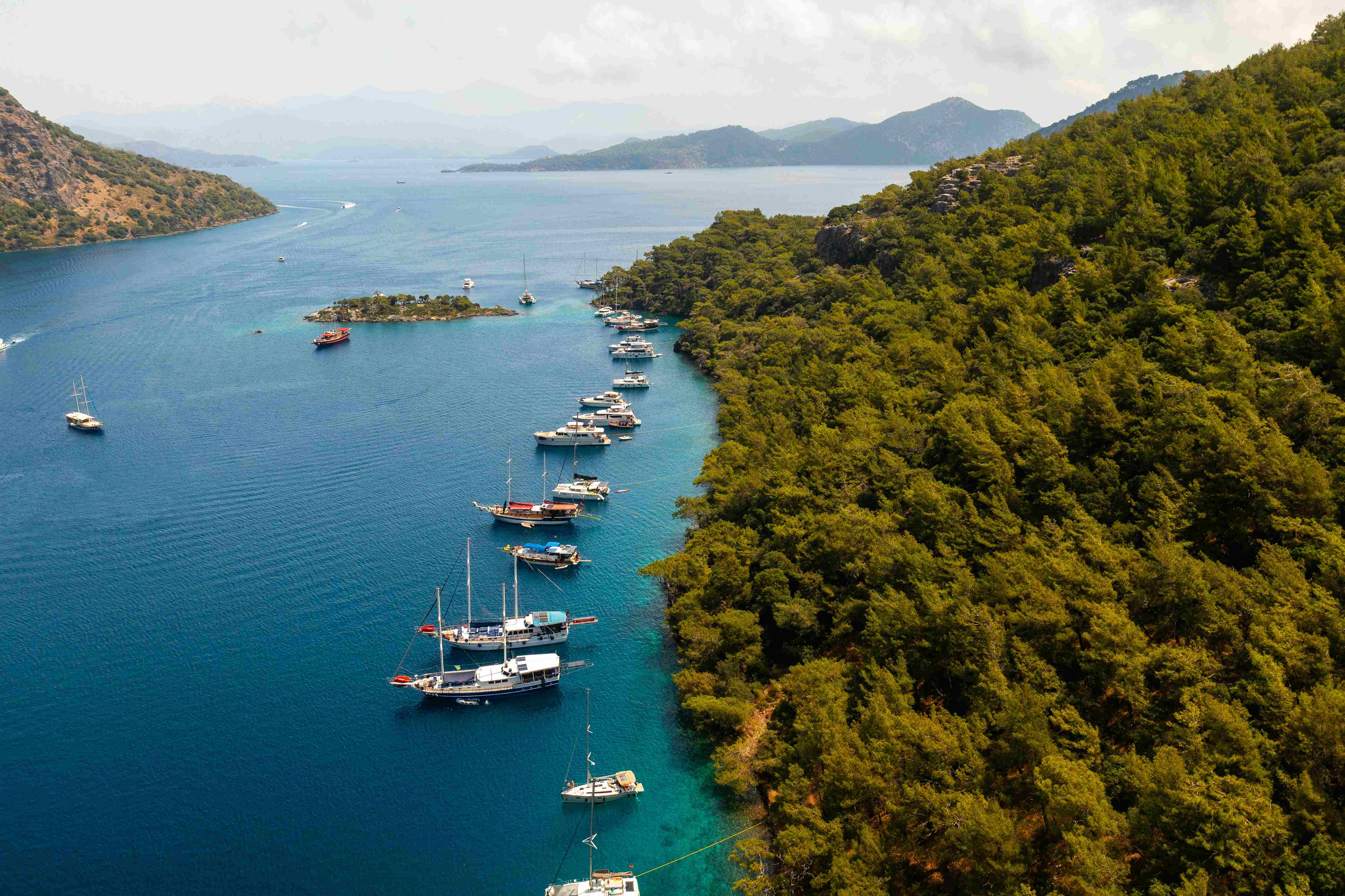 yachts anchored in Fethiye Göcek bay representing yacht charter operations in Turkey