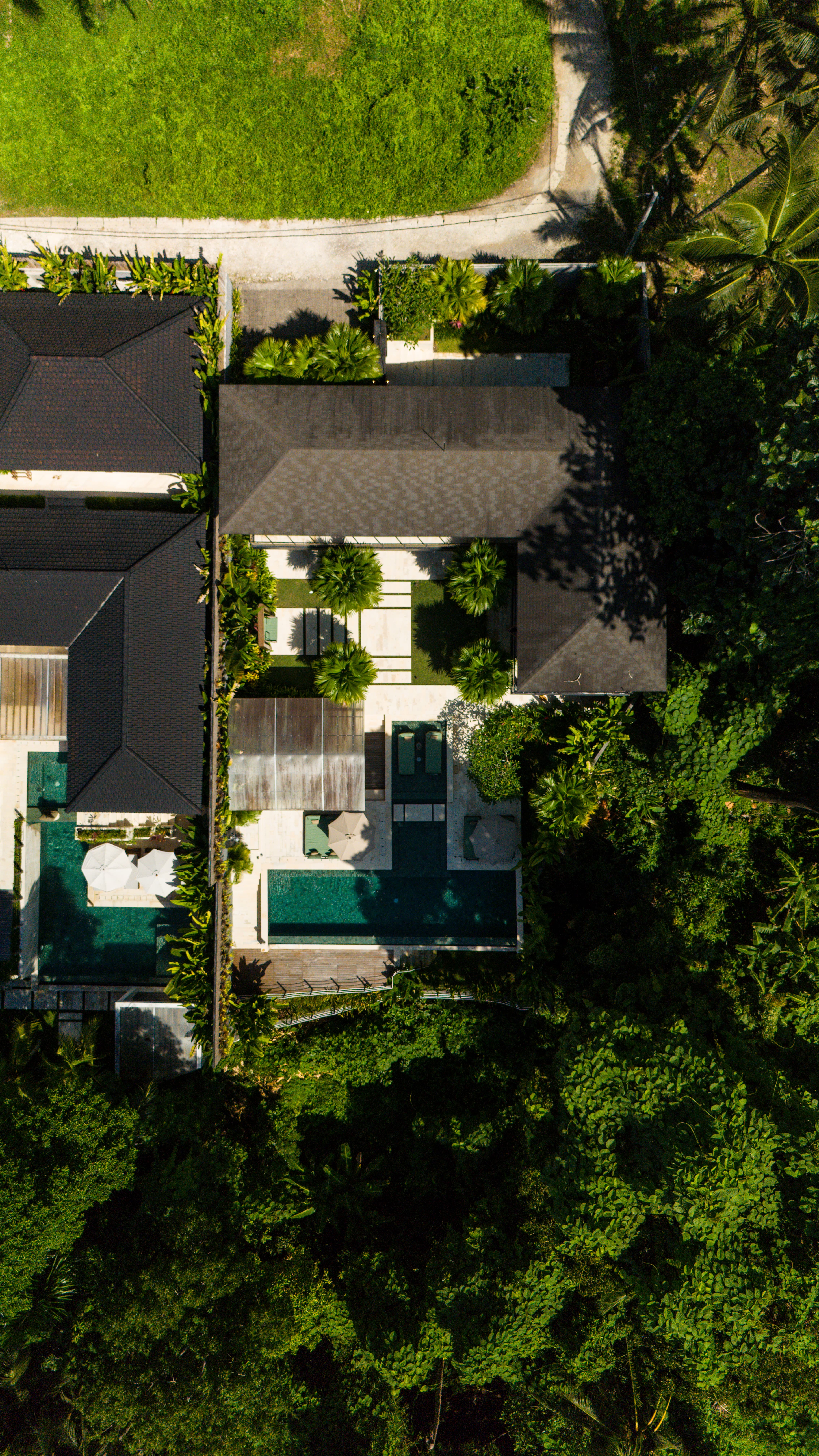 man in gray suit and woman in white wedding dress