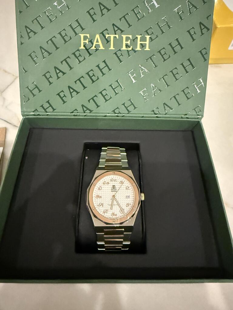 round silver-colored Rolex analog watch with link band