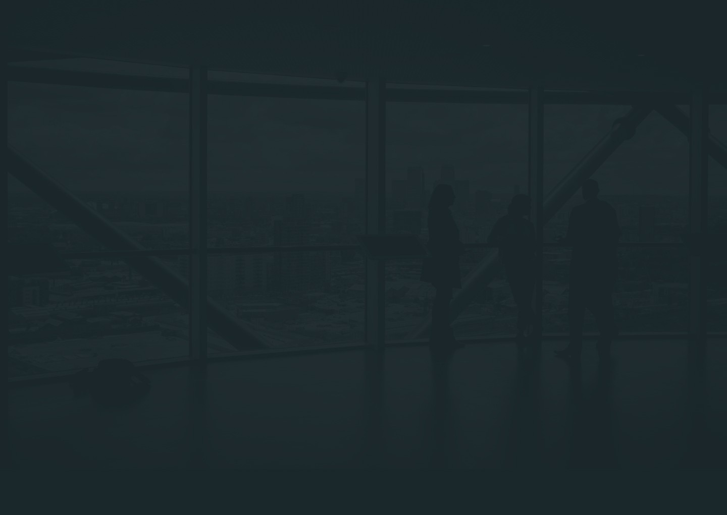 A network of professional people looking out a window.