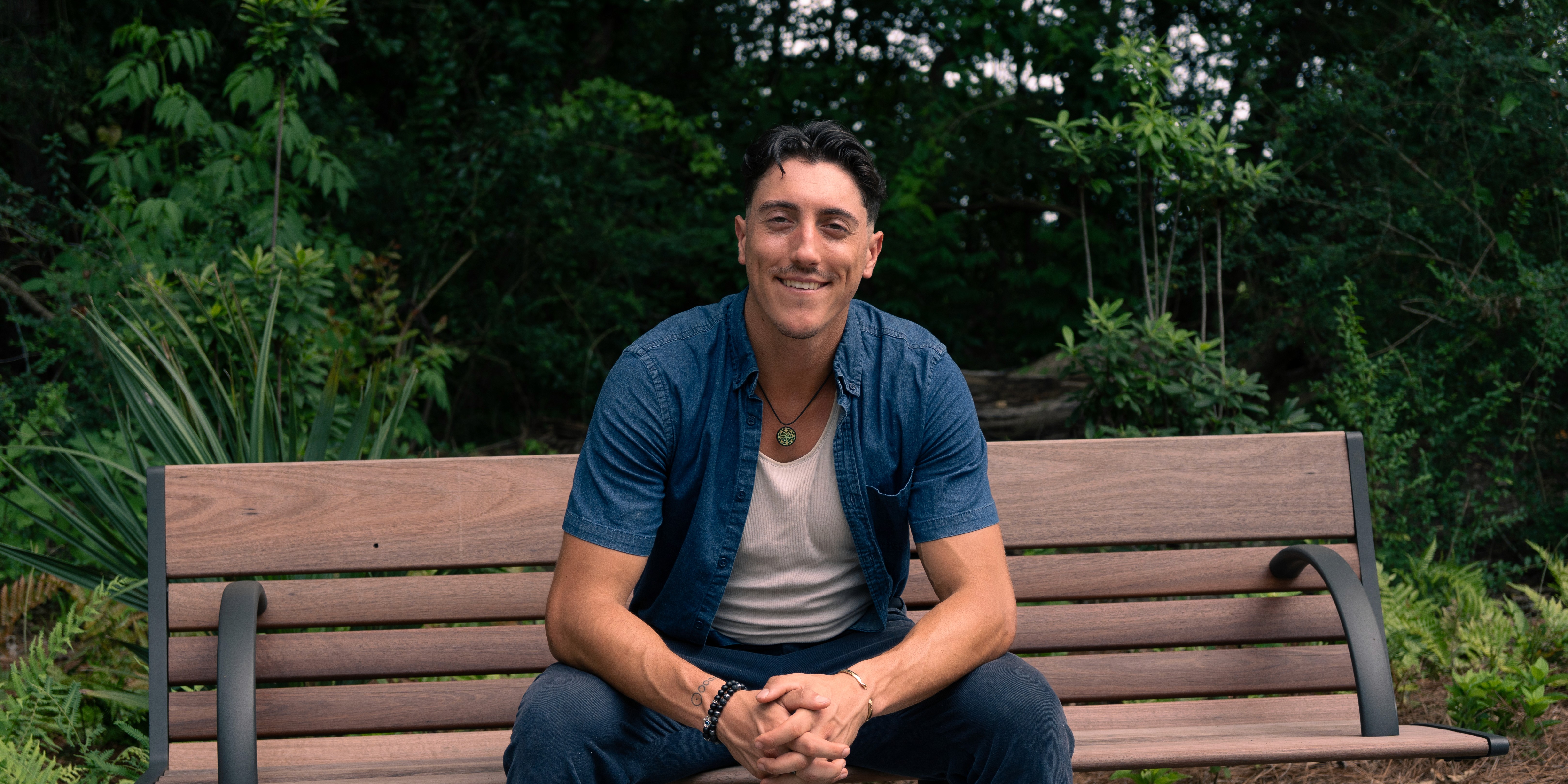 Reese LeBlanc somatic coach smiling outdoors