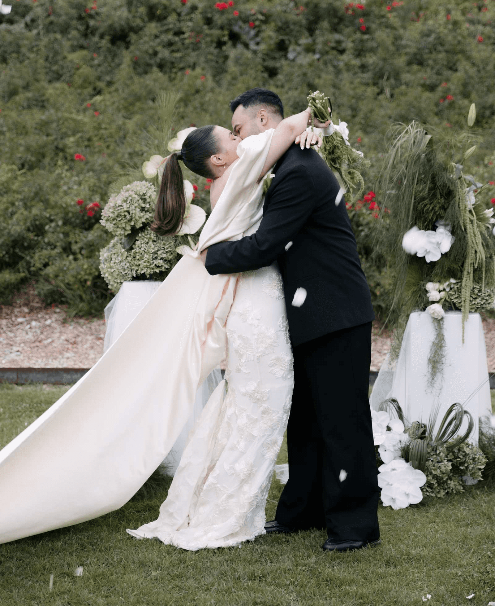Bride and groom embracing at their Melbourne wedding ceremony