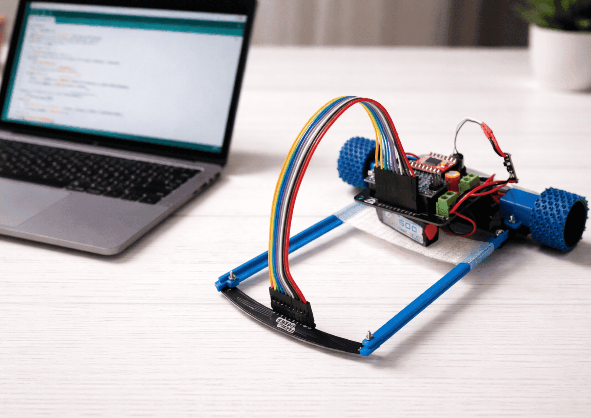 MARK 2 LINE FOLLOWING ROBOT ON TABLE WITH LAPTOP