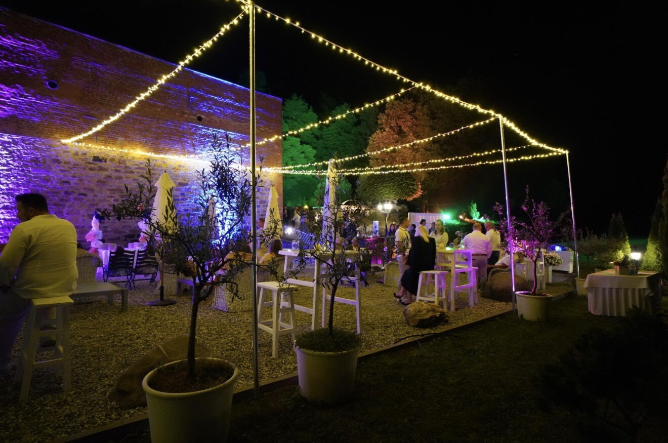 man wearing suit with laptop