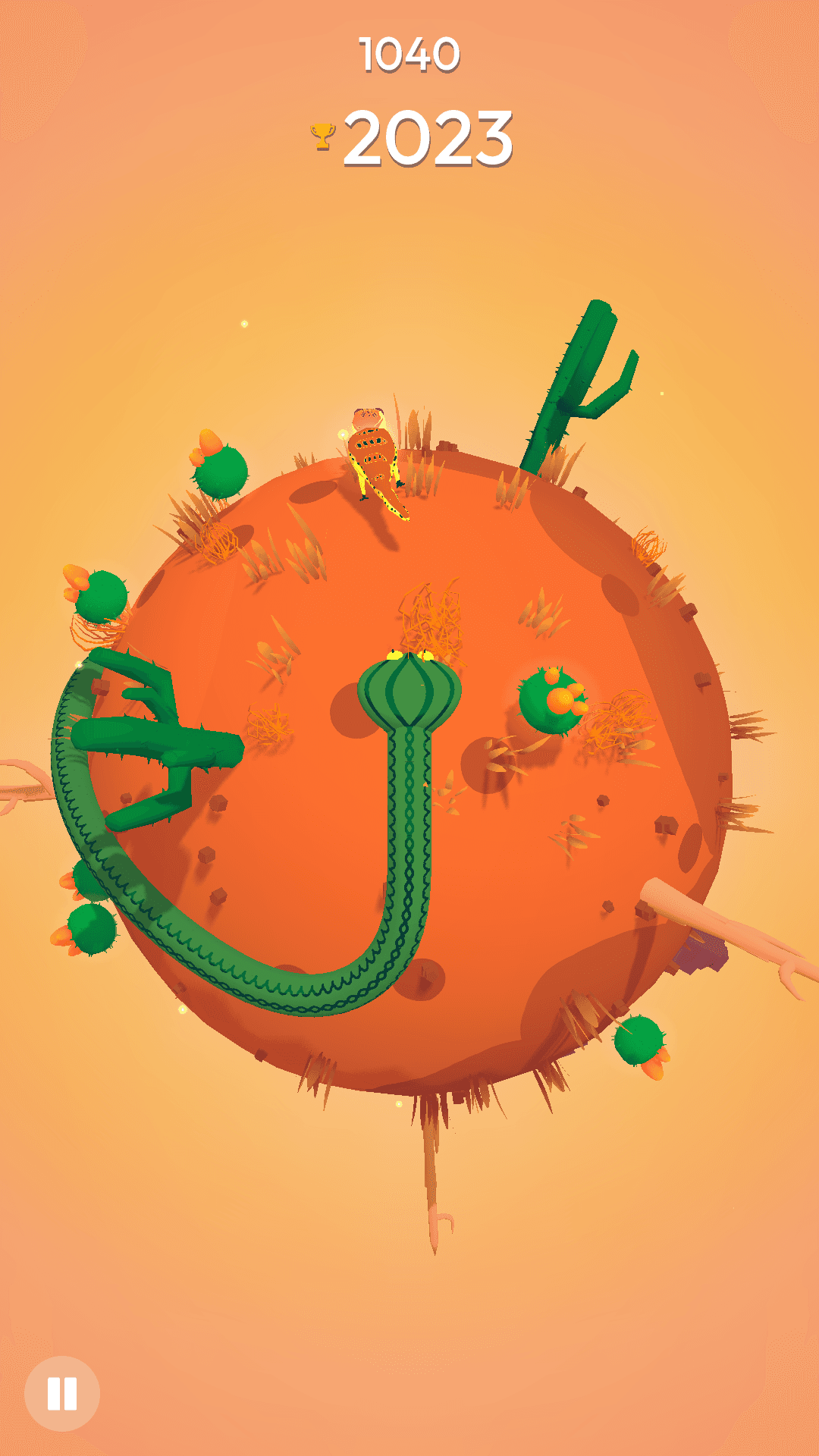 A green cobra snake on a spherical desert planet with cacti and bones, set against a dry yellow background.