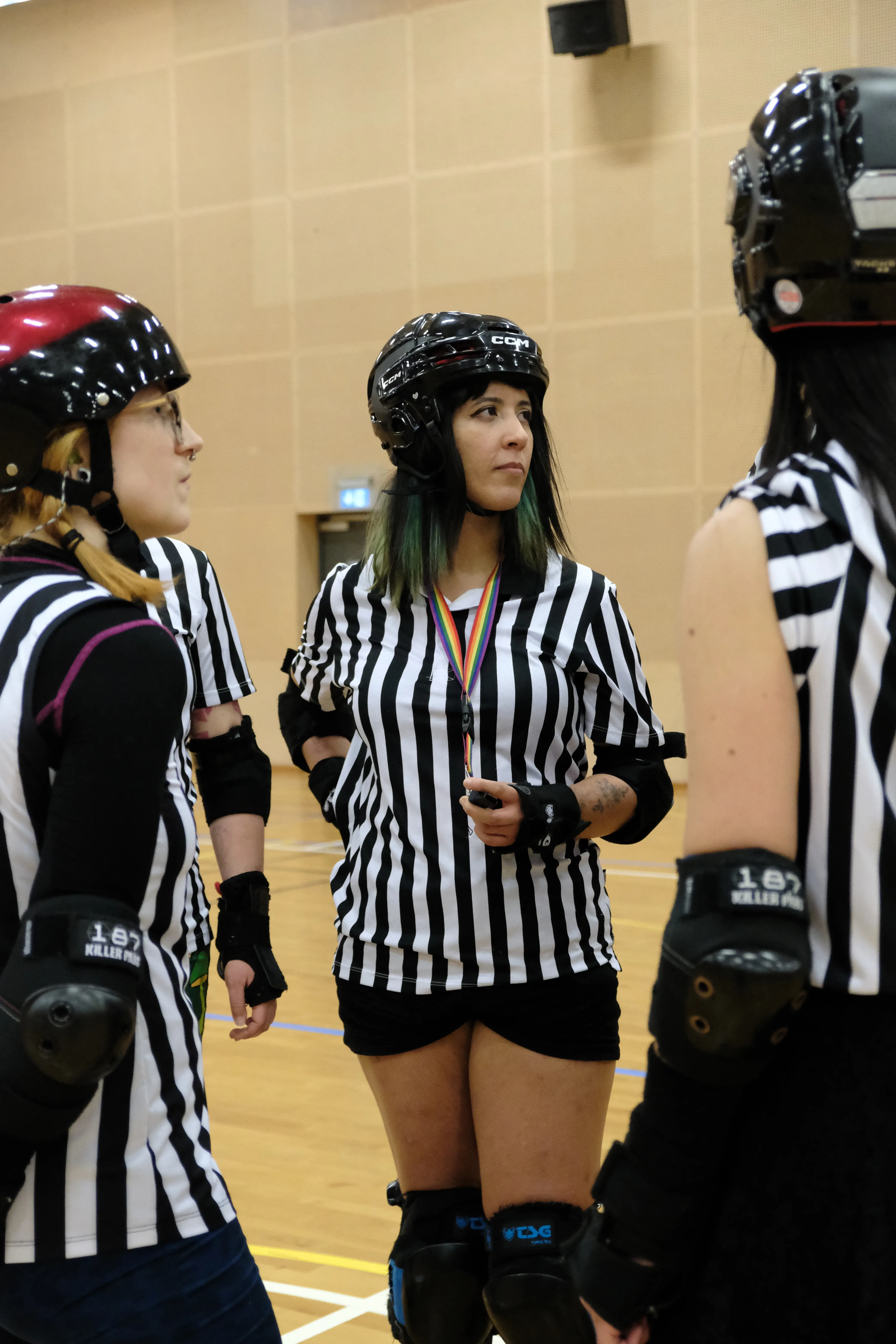 A referee looking at the game.