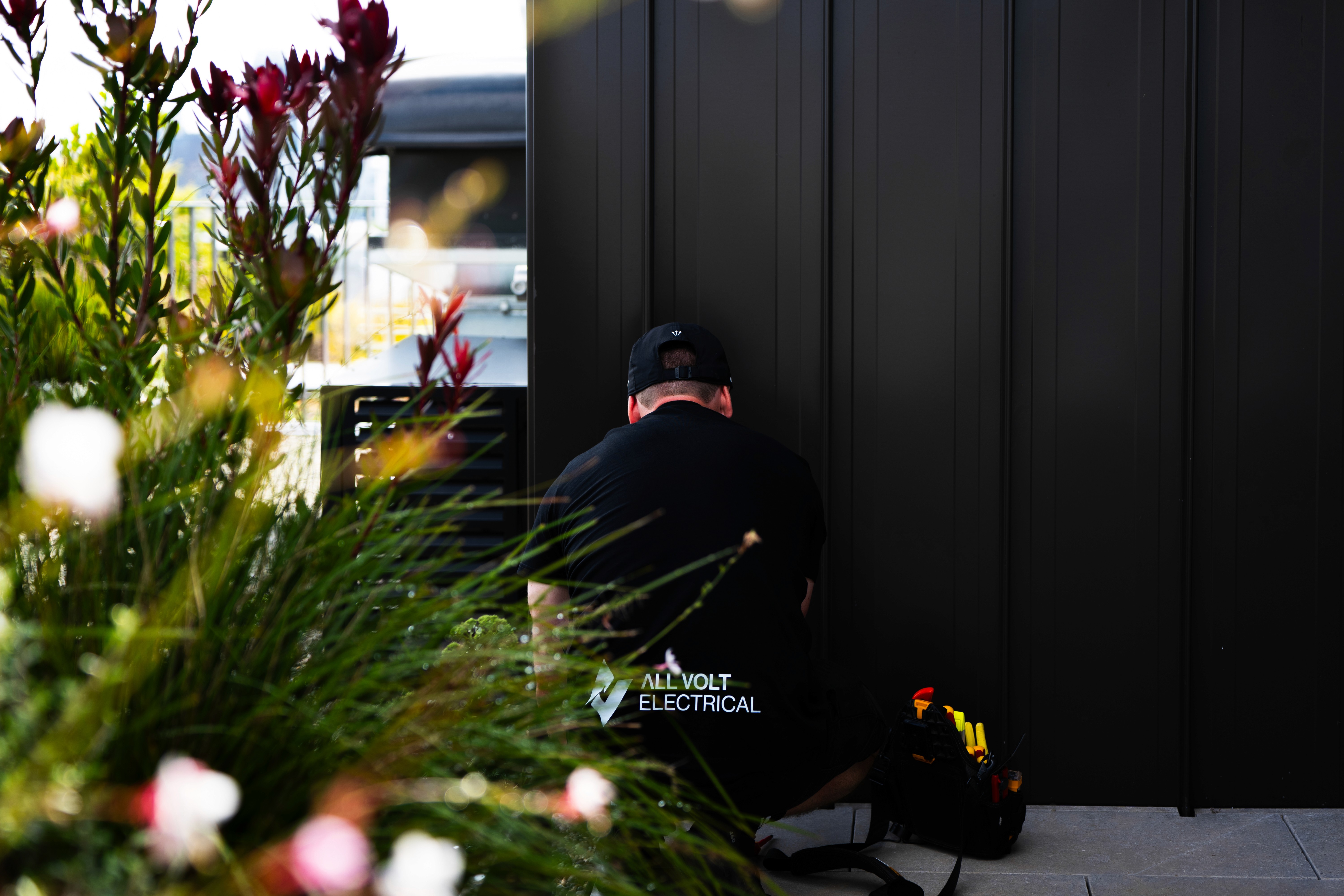 black pendant lamps turned on during daytime