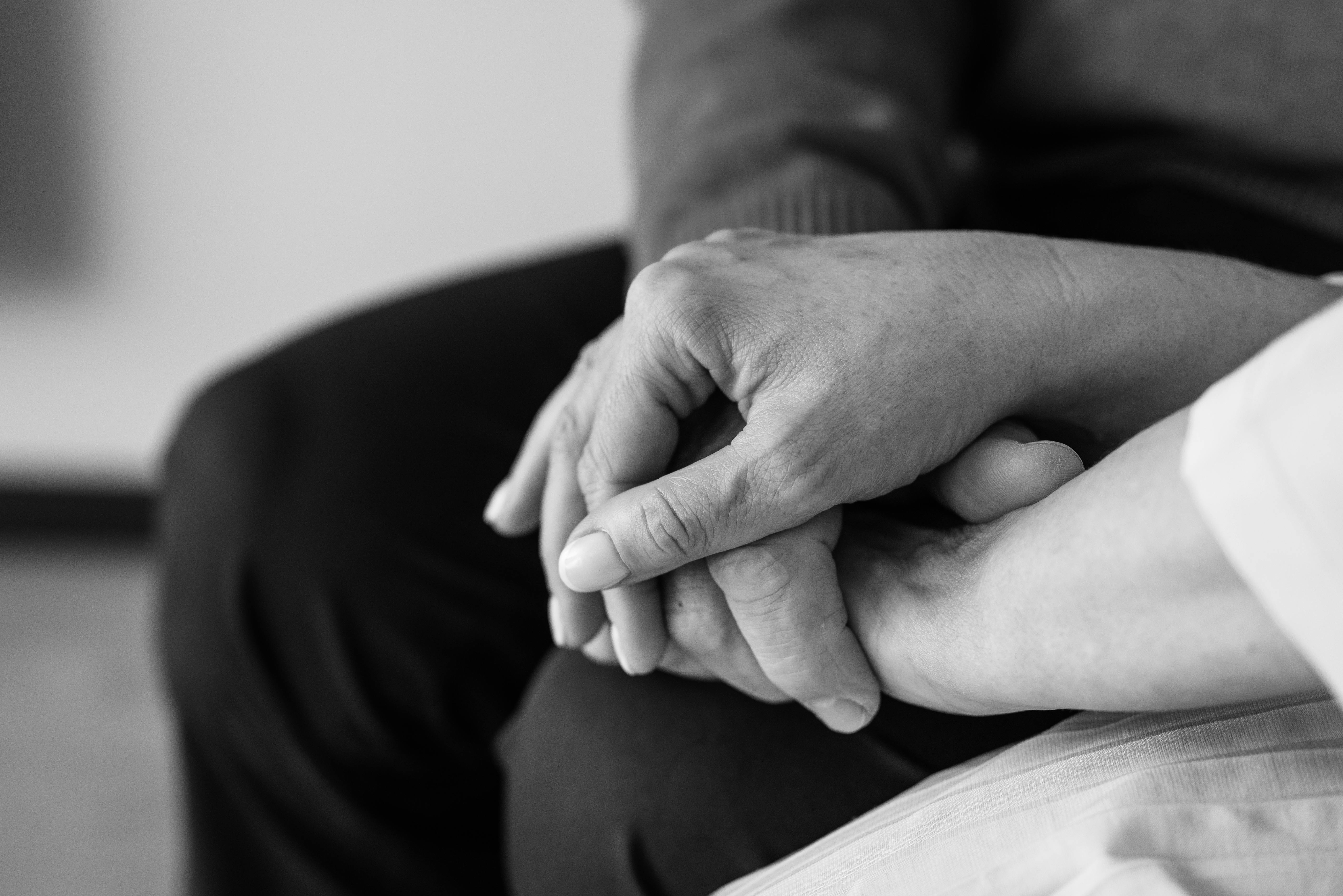 holding hands to support grief 