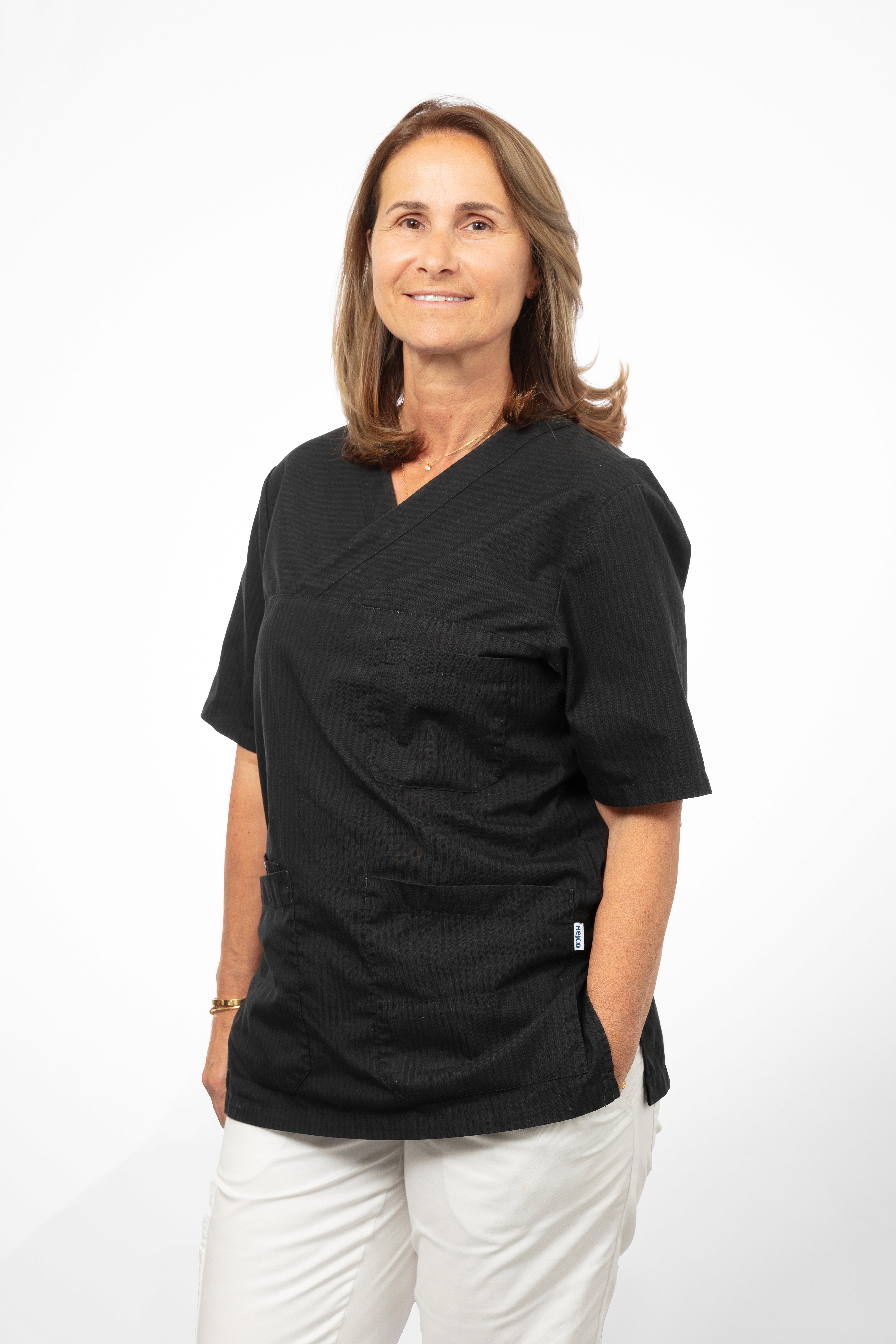 Receptionist Filis tar emot patient hos Lunatandläkarna