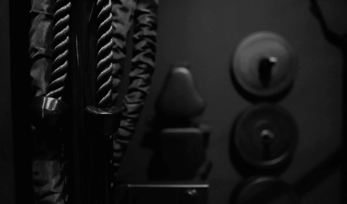 Close-up of gym equipment in a custom home gym build.