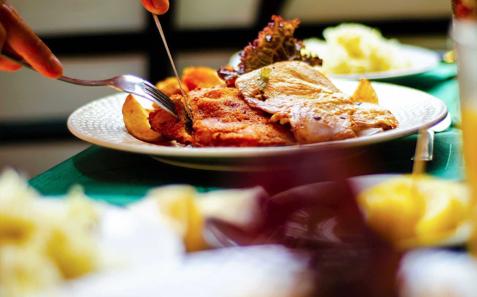 Dining experience on Danube Bend tour with traditional Hungarian meal.