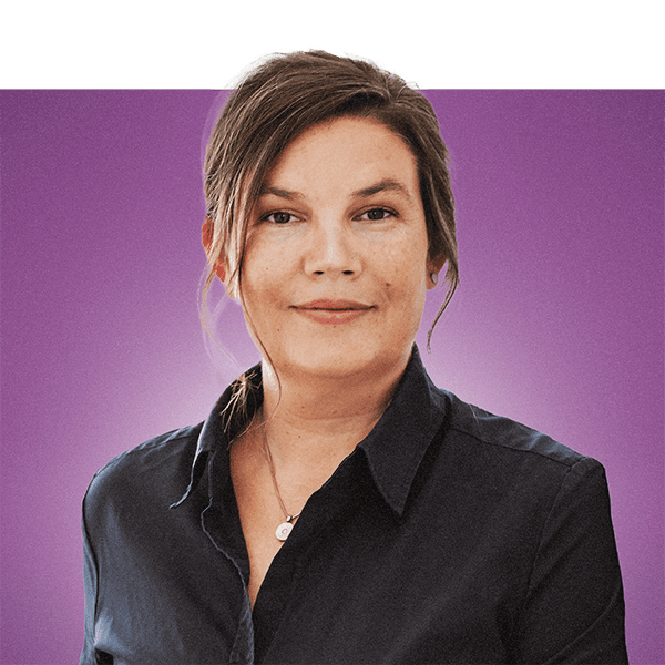 soccer player in blue and white jersey shirt and shorts standing on green grass field