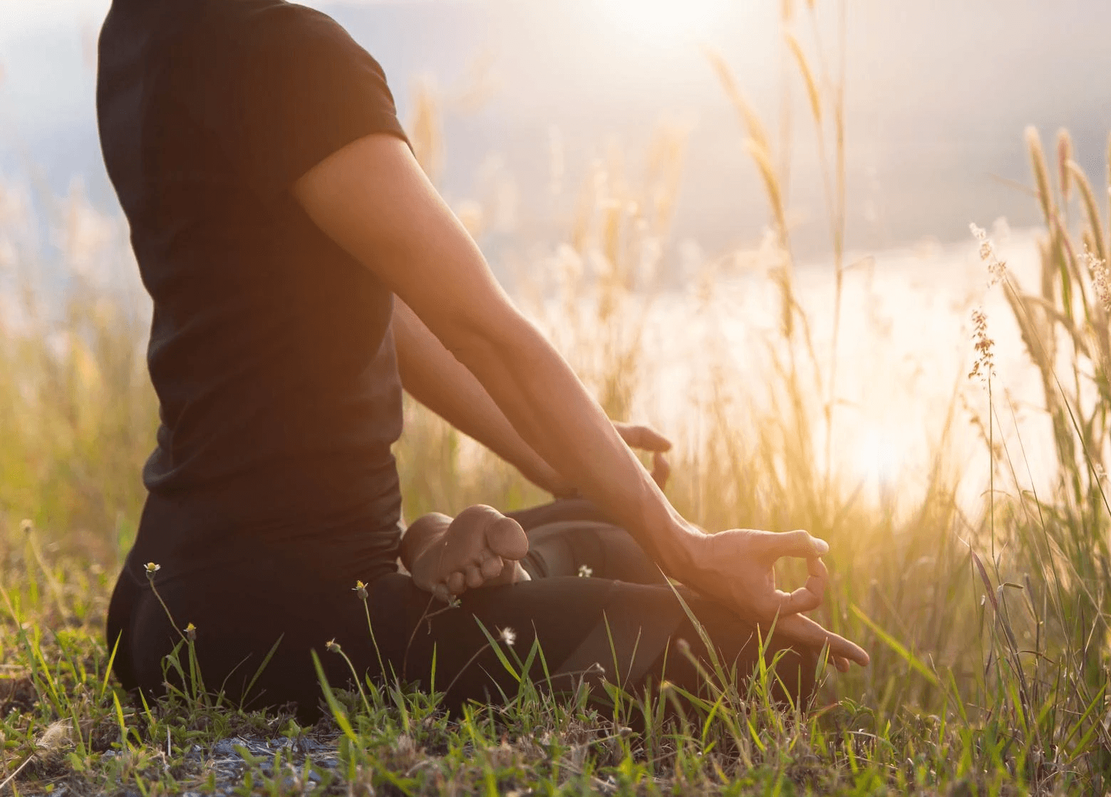 person writing on a piece of paper