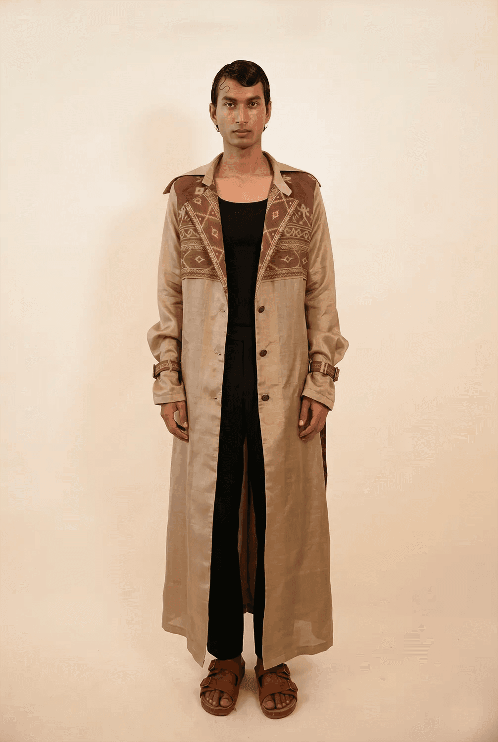 Vedya is our one-of-a-kind off-white silk trench coat, handcrafted by skilled artisans in-house using a one-of-a-kind vintage silk saree.