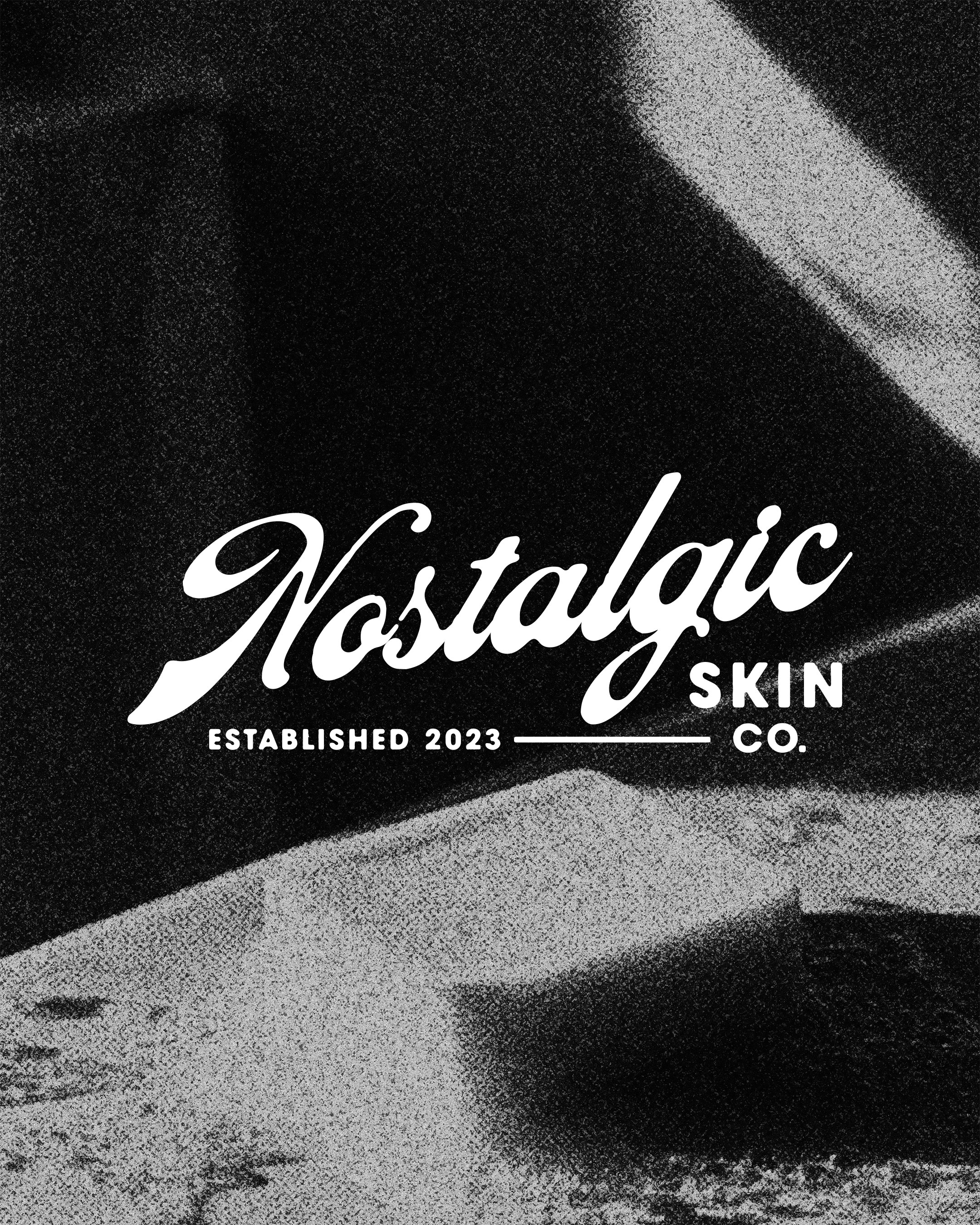 Nostalgic Skin Co. wordmark logo on textured black background