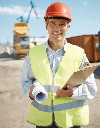 Man in hard hat and reflective gear on construction site