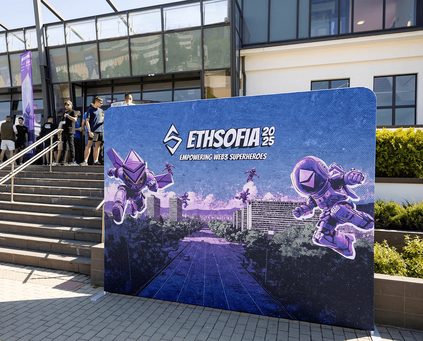 A photo of the real printed wall with ETHsofia branding