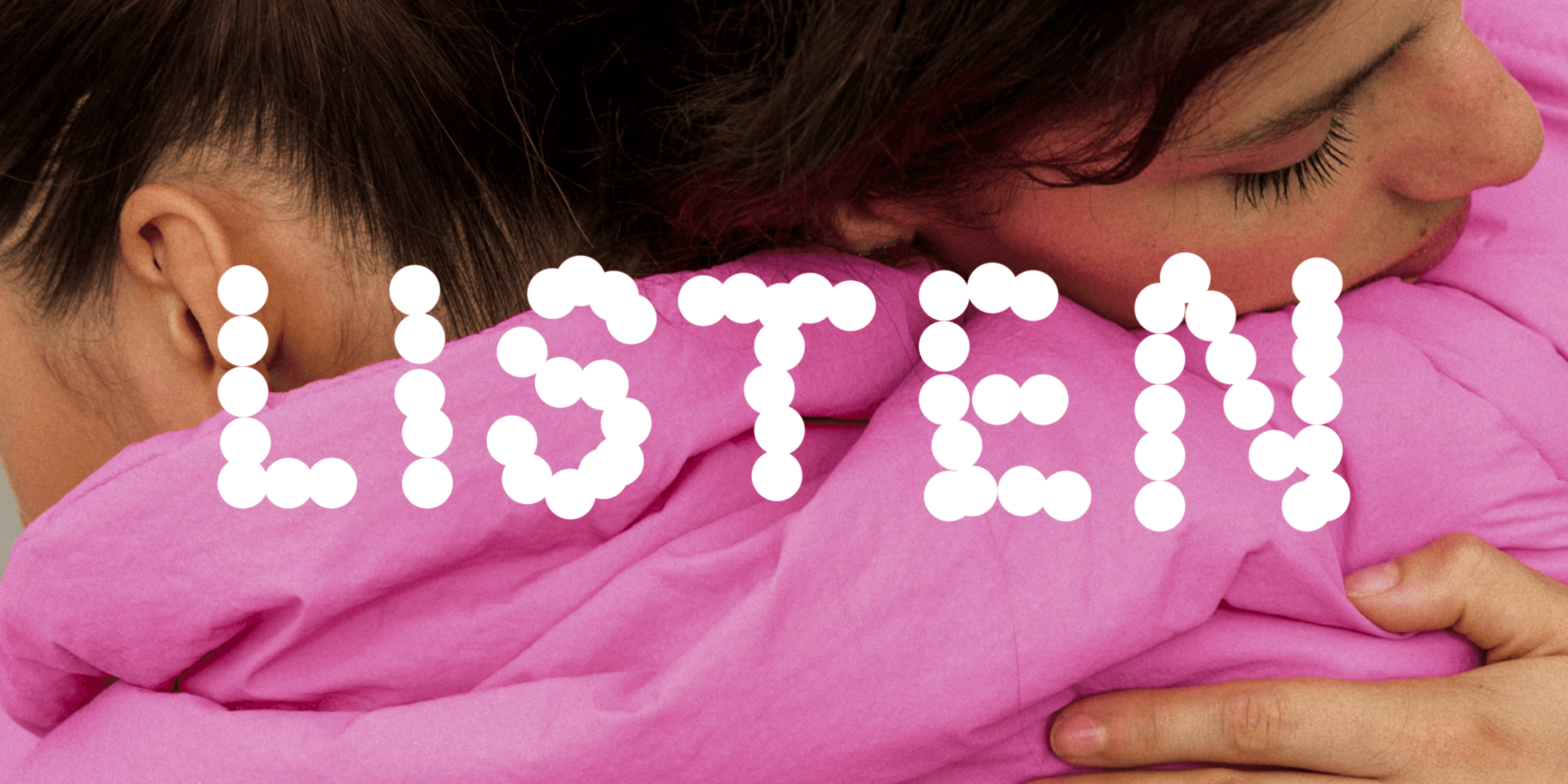 Closeup of two people hugging