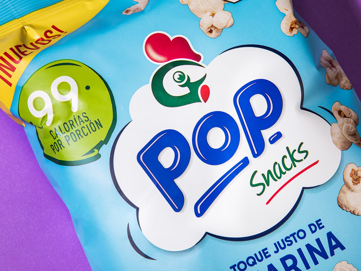 Rooftops of a coastal town with the sea in background