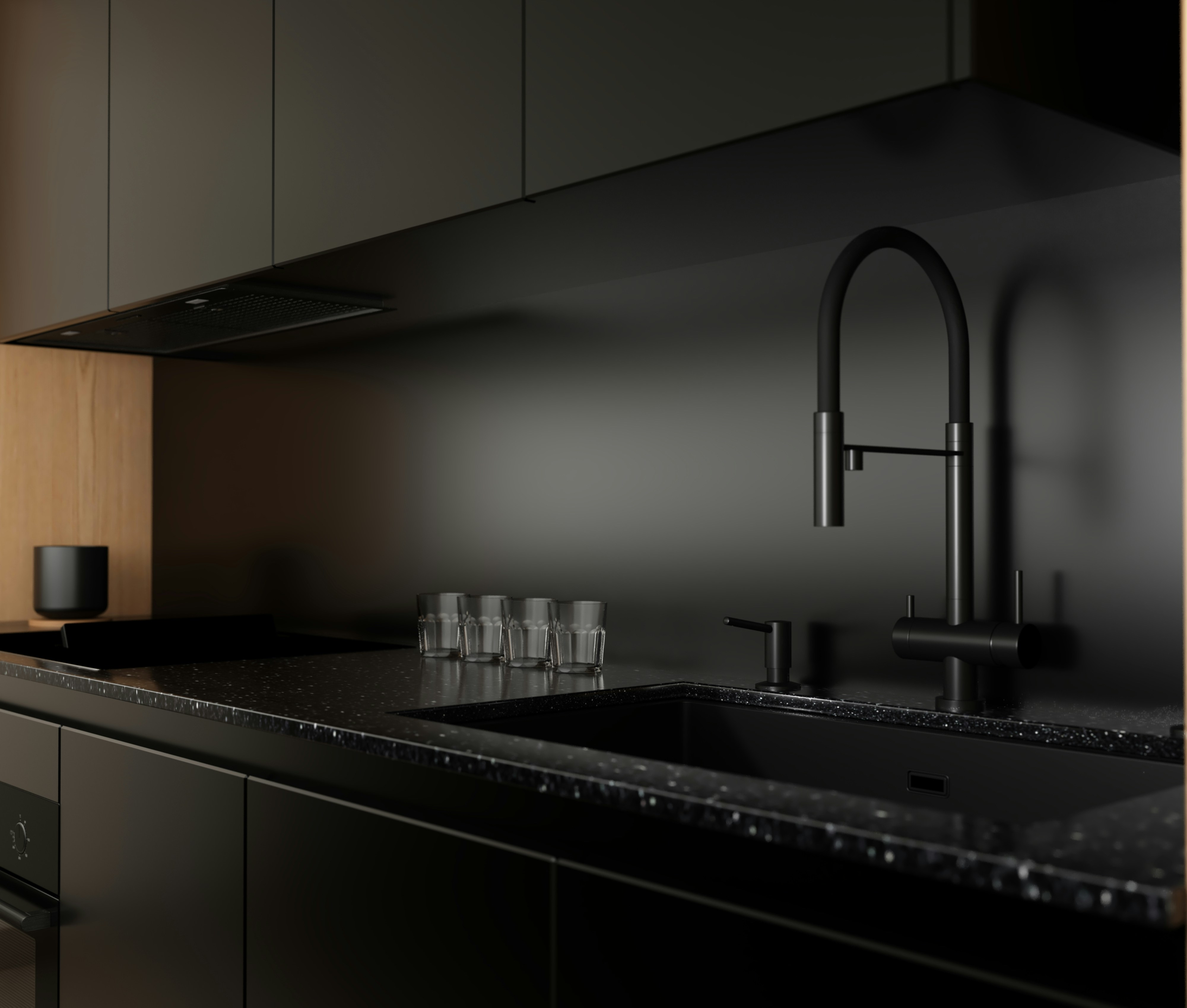 Minimal dark kitchen surface with soft directional light