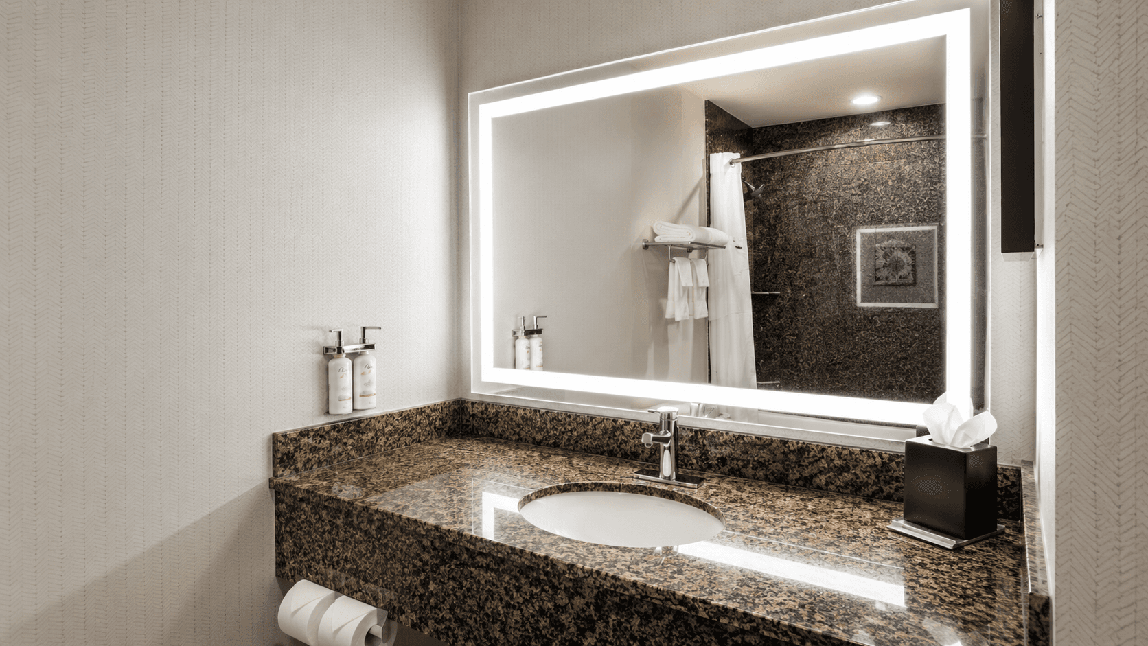 Holiday Inn by IHG — guest room furnishing details and coordinated casegoods.