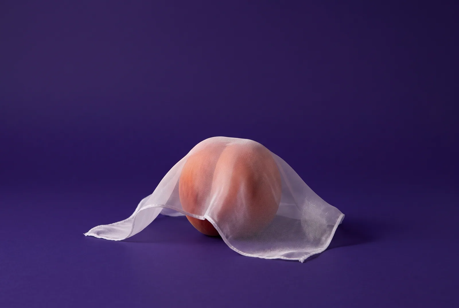 A peach under a sheer silk handkerchief, how to turn off sensitive content on X