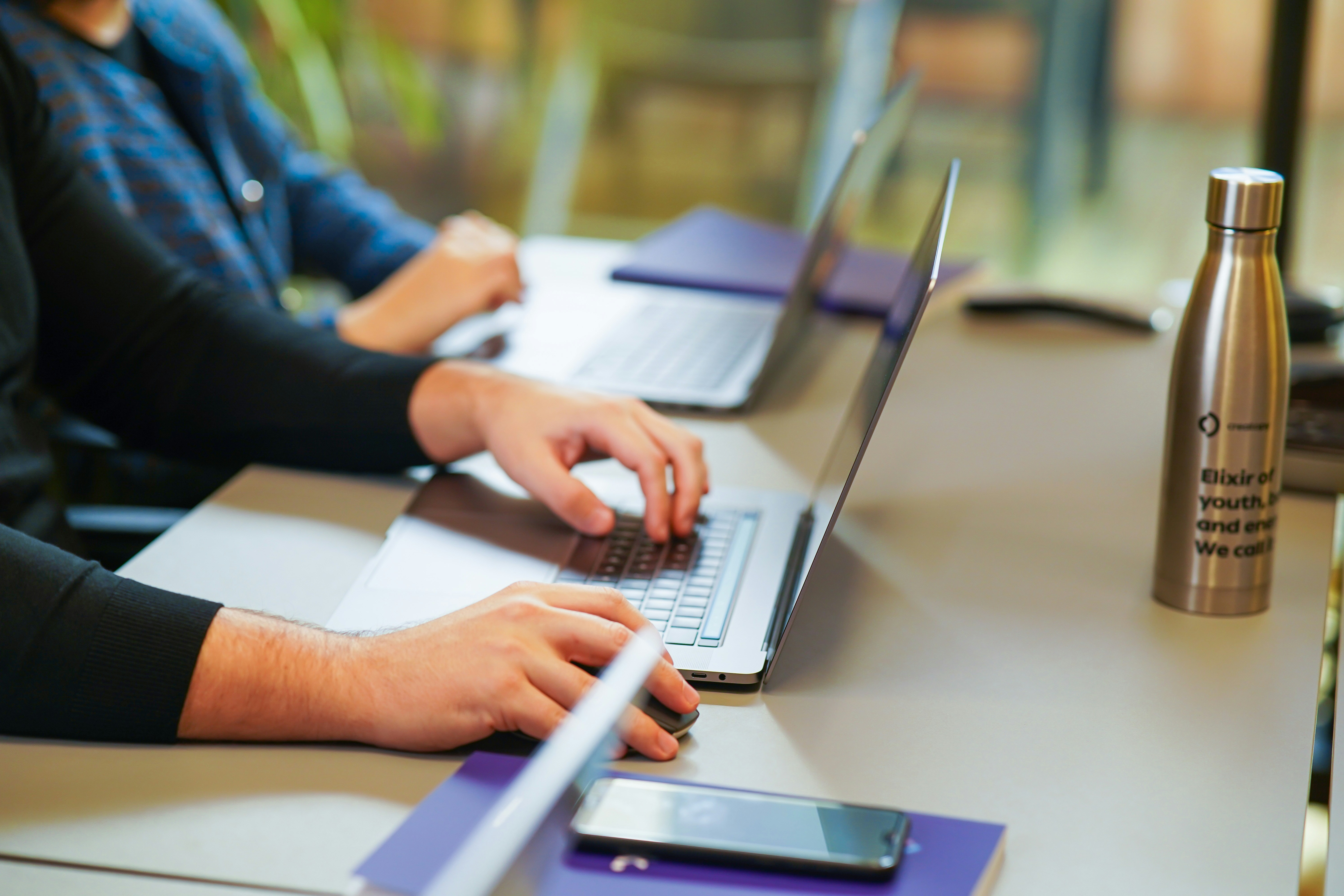 person sitting alone on a desk - ChatGPT Homework