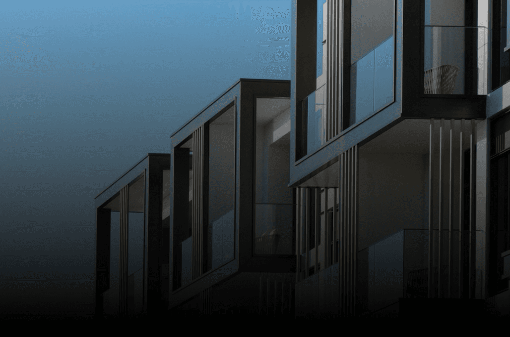 a man with glasses looking up into the sky