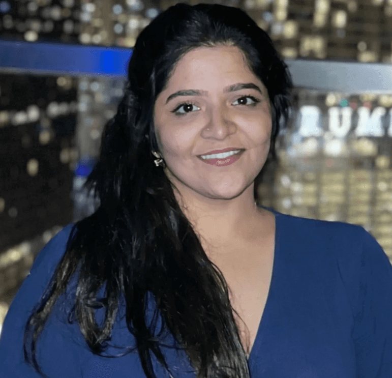 Black and white portrait of a man with a beard and glasses